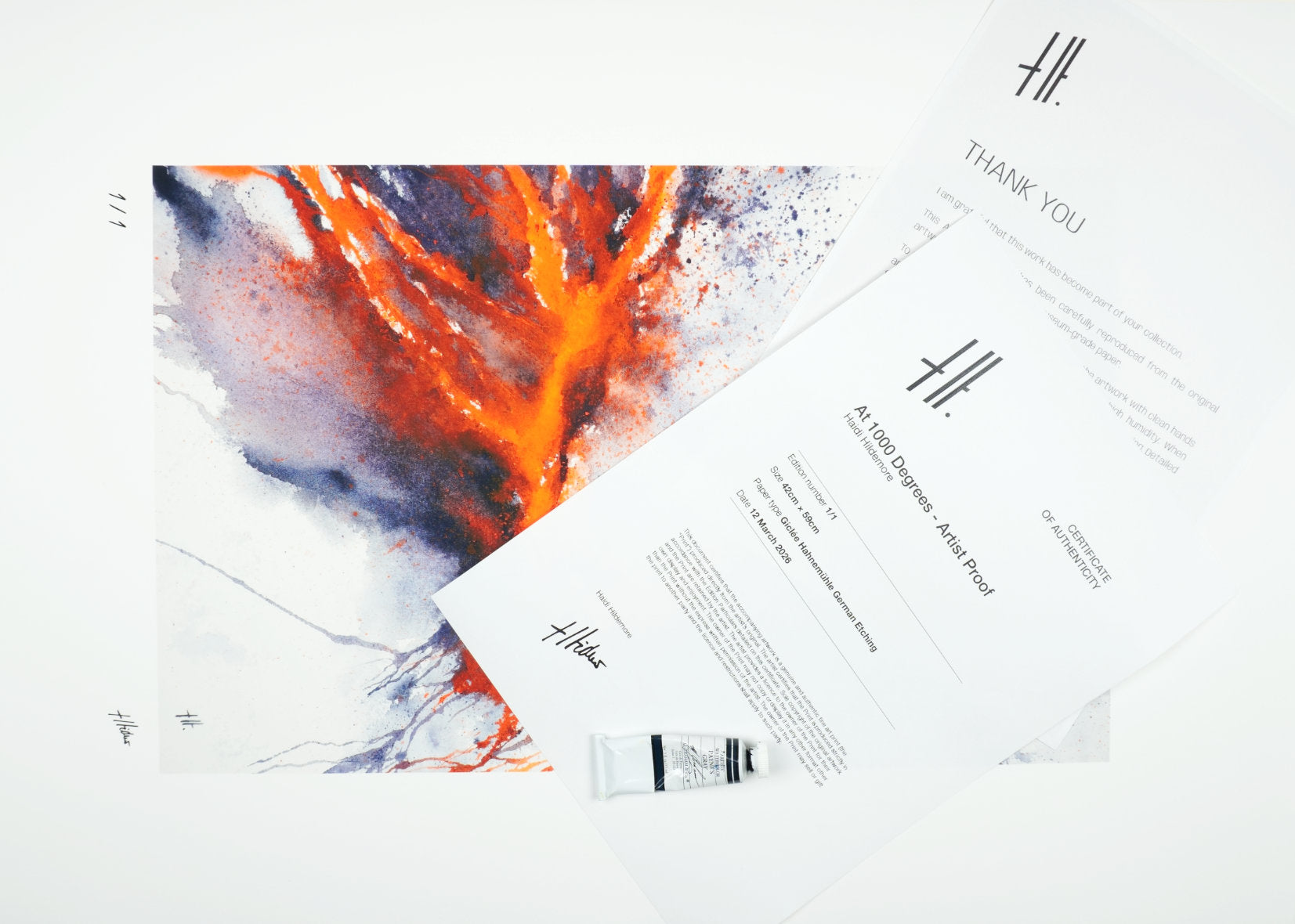 A limited edition artist proof of At 1000 Degrees on Hahnemühle German Etching paper, part of The Magma Collection by Haidi Hildemore, displayed with a certificate of authenticity and thank you letter.
